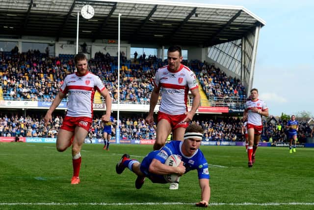 Matt Parcell scores for Rhinos against Hull KR in 2019. Picture by James Hardisty.