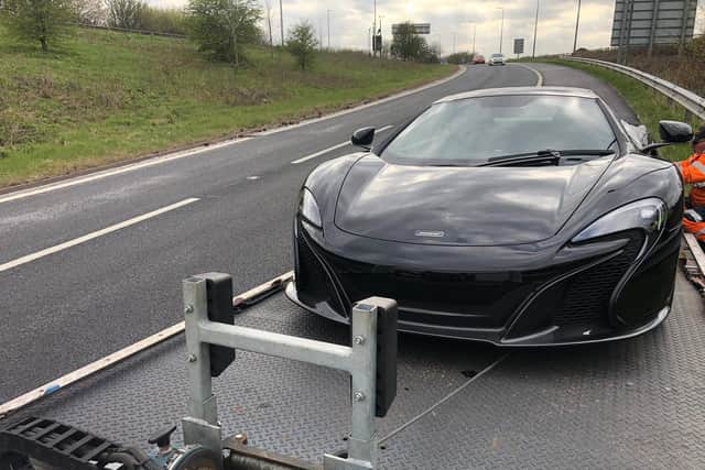 The McLaren being towed away (photo: WYP).