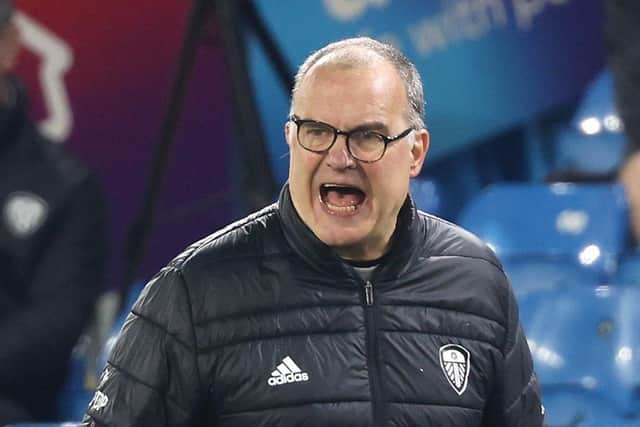 BACKING: Leeds United head coach Marcelo Bielsa instructs his players during Monday's clash with Liverpool. Picture: Clive Brunskill/PA Wire.