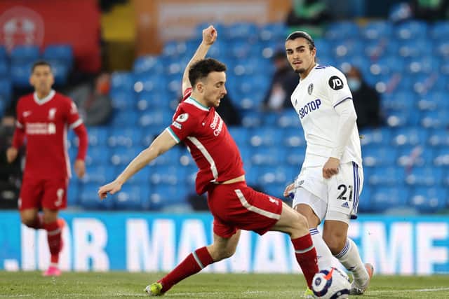 INFLUENTIAL: Liverpool's Diogo Jota and Leeds United's Pascal Struijk battle for the ball. Picture: Clive Brunskill/PA Wire.