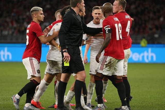 BITTER RIVALS - A coming together during a pre-season 'friendly' between Leeds United and Manchester United in Australia. Pic: Getty