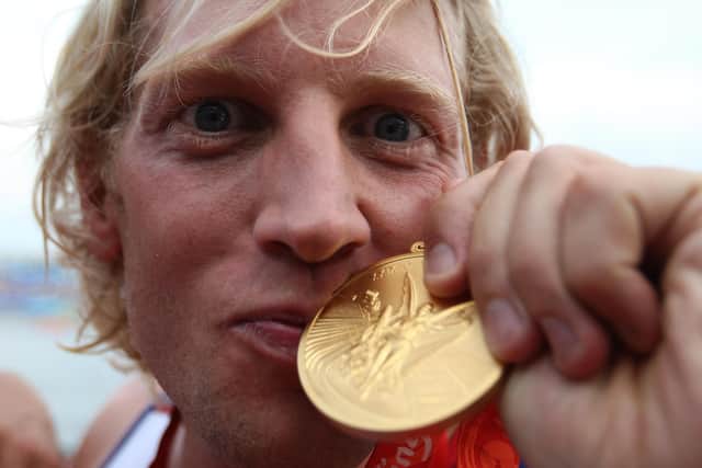 Great Britain's Andrew Triggs Hodge kisses his medal after winning gold during the mens four final at the Shunyi Olympic Rowing-Canoeing Park during the 2008 Beijing Olympic Games, China. (Picture: Andrew Milligan/PA Wire)