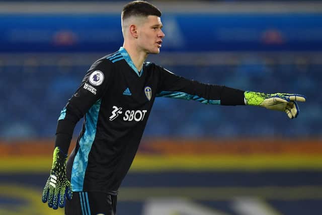 POINTING THE WAY: Leeds United goalkeeper Illan Meslier during Monday night's 1-1 draw against Liverpool at Elland Road. Photo by PAUL ELLIS/POOL/AFP via Getty Images.