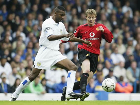 Leeds United legend Lucas Radebe in action against Manchester United in 2002. Pic: Getty