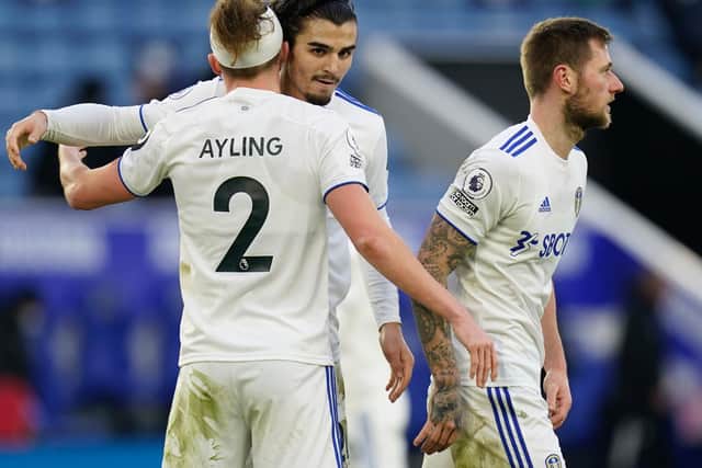 CONFIDENCE: From Leeds United defender Pascal Struijk, centre, pictured embracing Luke Ayling after January's 3-1 victory at Leicester City. Photo by Tim Keeton - Pool/Getty Images.