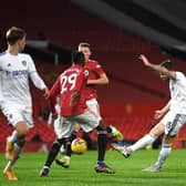 LESSONS LEARNED: By Leeds United in December's 6-2 defeat at Manchester United, pictured, in which Stuart Dallas, right, netted a fine strike for the Whites. Photo by Michael Regan/Getty Images.
