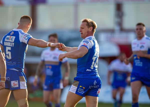 Bright spot: Brad Dwyer celebrates scoring Leeds' only try against Hull KR on a disappointing night for the Rhinos. Picture Bruce Rollinson