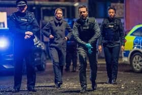 Martin Compston as Steve Arnott leads the charge at the scene of the Fleming-Pilkington shootout. PIC: BBC/World Productions/Steffan Hill