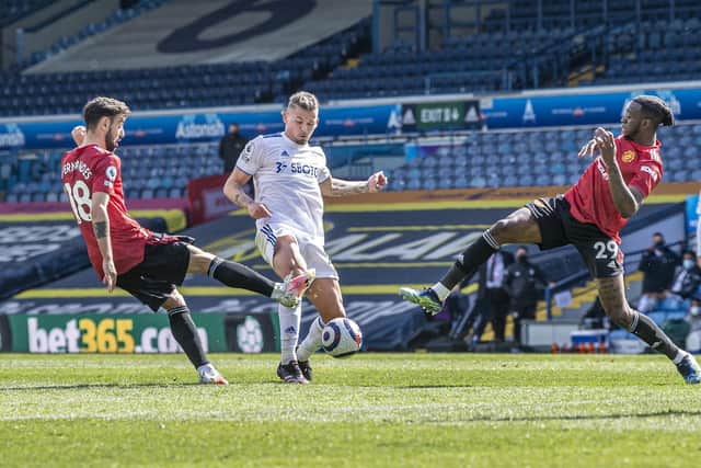 IMMENSE: Leeds United's England international midfielder Kalvin Phillips, centre, as Manchester United's Bruno Fernandes, left, and Aaron Wan-Bissaka, right, look to close in. Picture by Tony Johnson.