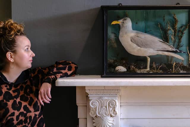 Martha Cattell with one of the exhibits in the new display due to open in May