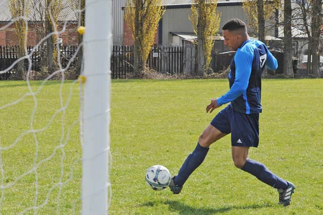 Elliot Harris scores for Division 1 champions Wykebeck Arms in the 2-2 draw at New Inn New Inn FC. Picture: Steve Riding.