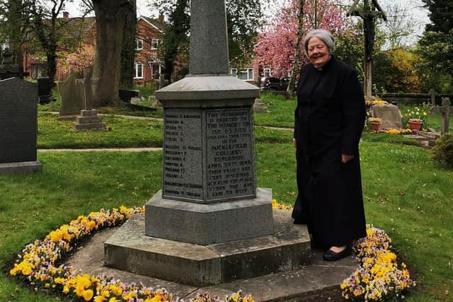 Rev Wendy Plant at the memorial to the victims outside  St Mary’s Church, Micklefield.