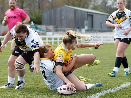 Chloe Kerrigan touches down for Rhinos in their win over York. Picture by Ed Sykes/SWpix.com.