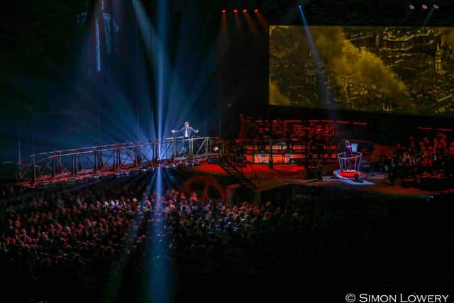 Arena shot with The Artilleryman (Adam Garcia) on the Bridge