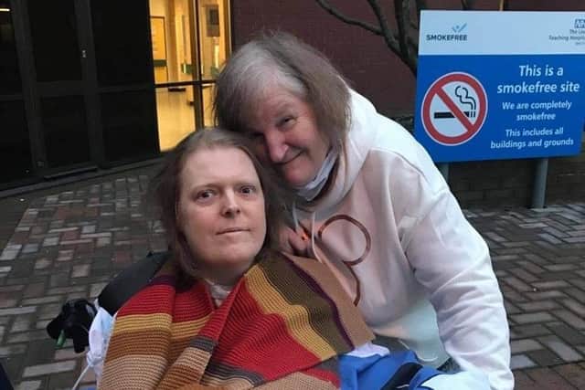 Jason and Sue Kelk, pictured together during one of Jason's recent trips outside St James' Hospital, where he has been an intensive care Covid patient since March.