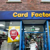 File photo of shoppers entering the Card Factory in Newcastle-under-Lyme, Staffordshire.