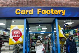 File photo of shoppers entering the Card Factory in Newcastle-under-Lyme, Staffordshire.