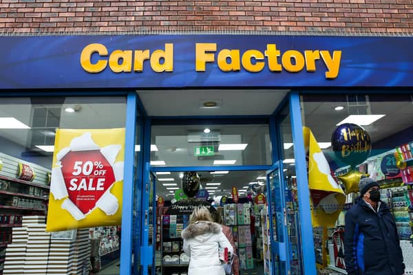 File photo of shoppers entering the Card Factory in Newcastle-under-Lyme, Staffordshire.