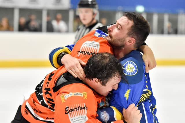 BODY ON THE LINE: Sam Zajac led from the front for the Leeds Chiefs, seen here dropping the gloves at Telford Tigers. 
Picture courtesy of Steve Brodie.
