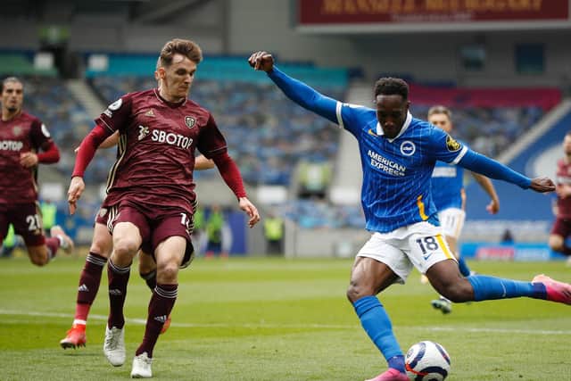 MENACE: Brighton forward Danny Welbeck, right, pictured during Saturday's clash at the Amex as Leeds United's Diego Llorente, left, looks to close in. Photo by John Sibley - Pool/Getty Images.