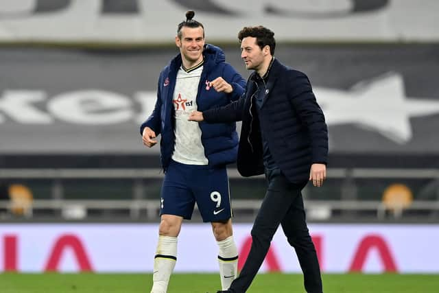 WINNING TEAM: Tottenham's interim head coach Ryan Mason, right, with hat-trick hero Gareth Bale after Sunday night's 4-0 victory at home to Sheffield United. Photo by JUSTIN SETTERFIELD/POOL/AFP via Getty Images.