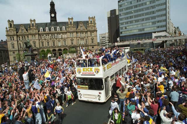BEDLAM: Fans flock to the streets of Leeds city centre to cheer Leeds United's 1992 title heroes. Picture by YPN.
