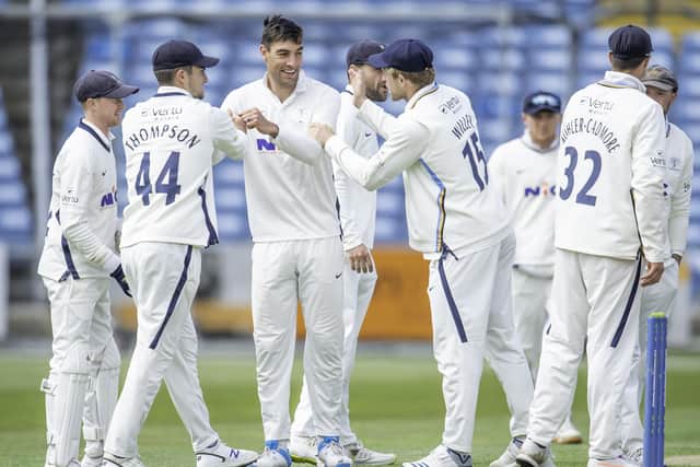 Got him: Yorkshire's Duanne Olivier is congratulated on dismissing Northamtonshire's Saif Zaib. Picture: Allan McKenzie/SWpix