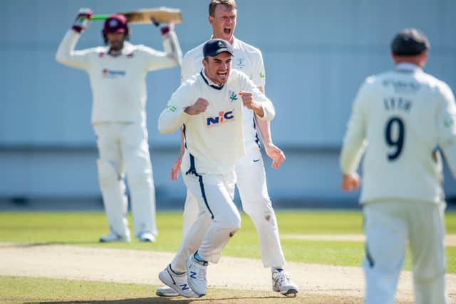 GOT HIM: Yorkshire's Jordan Thompson & Steven Patterson celebrate after claiming a thrilling one-run victory over Northamptonshire. Picture by Allan McKenzie/SWpix.com