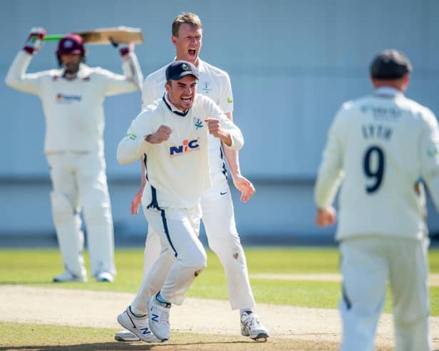 GOT HIM: Yorkshire's Jordan Thompson & Steven Patterson celebrate after claiming a thrilling one-run victory over Northamptonshire. Picture by Allan McKenzie/SWpix.com