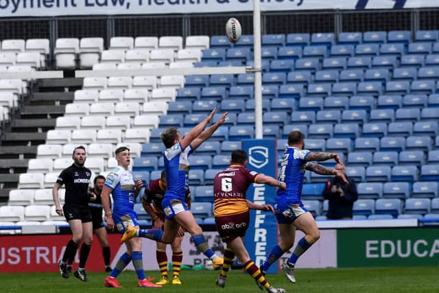 Heartache for Leeds Rhinos at Huddersfield Giants as Lee Gaskell lands the winning drop goal. Picture: Simon Hulme/JPIMedia.