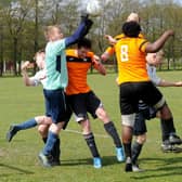 FC  Scholes goalkeeper Paul Rennison punches bravely against Beck & Call FC striker Jamie Halshaw during Sunday's Leeds Combination Division 2 encounter. Picture: Steve Riding.