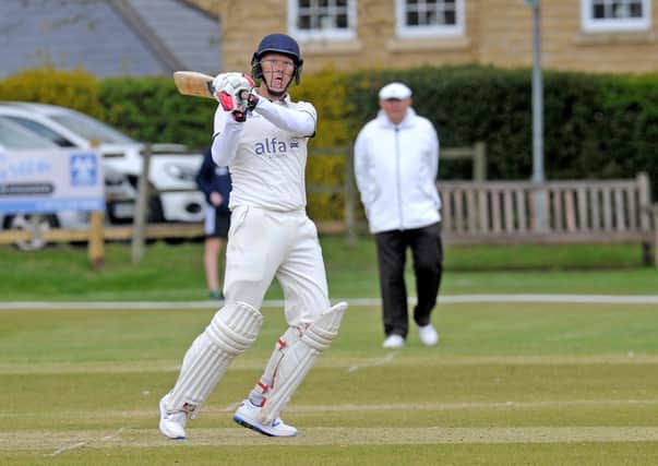New Rover opener Michael Richmond in action against Adel in Aire-Wharfe League Division Two. Picture: Steve Riding.