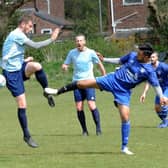 Farsley Juniors goal scorer Craig Farrand and Hassan Abrar, of Alwoodley, challenge for the ball. Picture: Steve Riding.