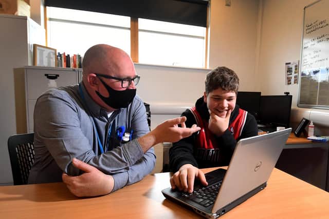 English Teacher Ben Powell pictured with student Lewis Harrison at Southway School Hub in Leeds. Picture by Simon Hulme.