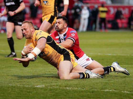 Liam Watts scores for Tigers in last week's Super League win over Salford. Picture by Paul Currie/SWpix.com.
