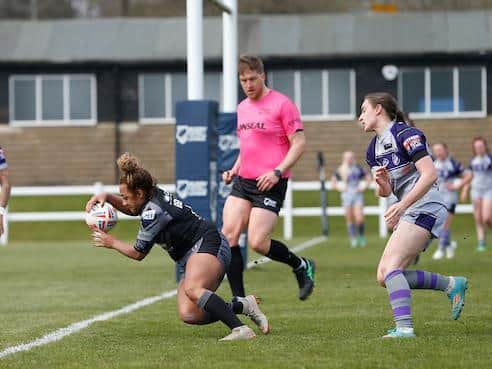 Kelsey Gentles scores for Tigers in a Super League win over Featherstone Rovers last month. Picture by Ed Sykes/SWpix.com.