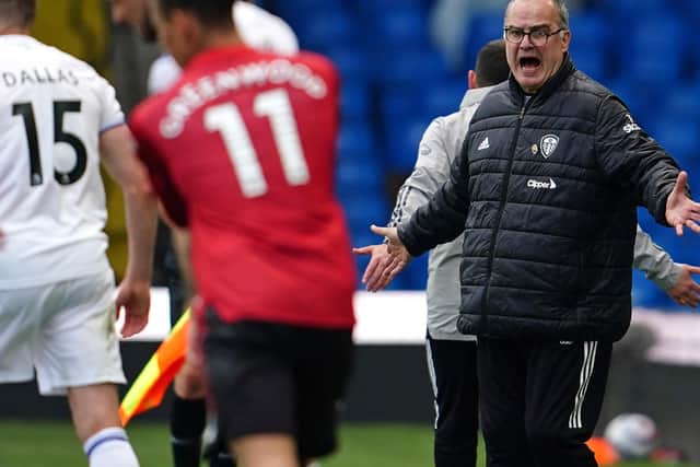 AWESOME APRIL: For Leeds United head coach Marcelo Bielsa, right, pictured during the goalless draw at home to Manchester United. Photo by JON SUPER/POOL/AFP via Getty Images.