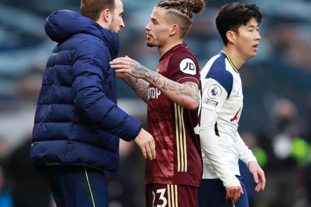 KEY MEN: Leeds United's England international midfielder Kalvin Phillips, centre, with Tottenham's Harry Kane, left, and Son Heung-Min, right, after January's 3-0 defeat in north London. Photo by IAN WALTON/POOL/AFP via Getty Images.