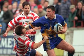Adrian Morley fends off Andy Patmore of Oldham in 1996. Picture: Steve Riding.