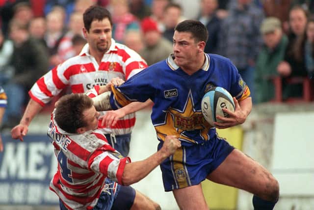 Adrian Morley fends off Andy Patmore of Oldham in 1996. Picture: Steve Riding.