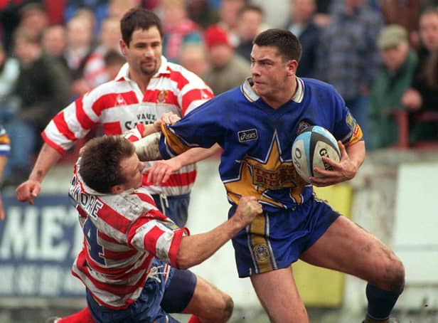 Adrian Morley fends off Andy Patmore of Oldham in 1996. Picture: Steve Riding.