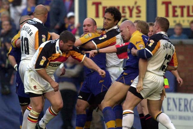 FISTICUFFS : Leeds Rhinos and Bradford Bulls players are involved in a scuffle. Adrian Vowles and James Lowes were ultimately sin-binned. Picture: Steve Riding.