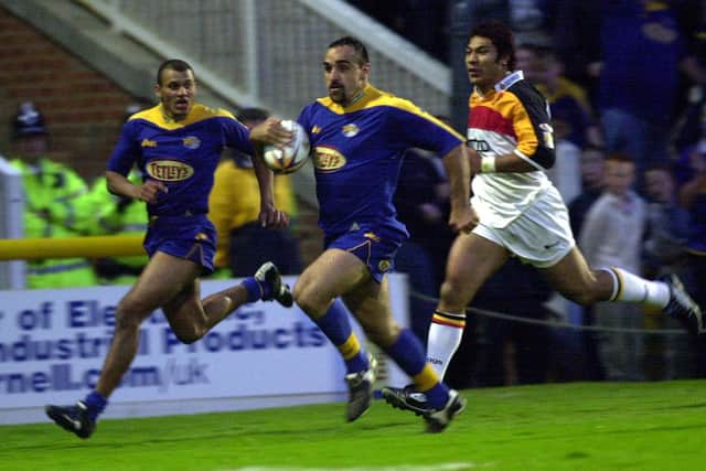 GOING IN: Tonie Carroll goes in to score against Bradford Bulls on this day in 2002. Picture: Steve Riding.