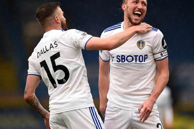 EYEING THE FANS: Leeds United's stand in skipper Luke Ayling, right, celebrating with goalscorer Stuart Dallas, left, after the Whites opener in Saturday's 3-1 victory against Tottenham Hotspur at Elland Road. Photo by Oli Scarff - Pool/Getty Images.