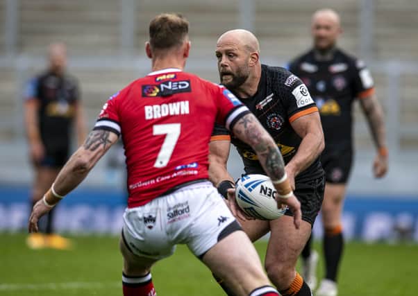 KEY MAN: Castleford Tigers' Paul McShane on the attack against Salford Red Devils. Picture: Tony Johnson.