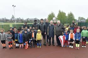 Pictured: Jake Boyd, centre left, football coach, with Freemasons Phil Fraser, Michael Rose, Alex Ullmann, Raymond Diamond from The Lodge of Dawn, Headingley, and kids from the centre. Picture: Steve Riding