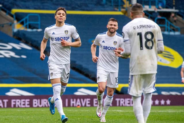 SEALED THE DEAL: Leeds United's record signing Rodrigo, left, heads to celebrate with Raphinha, right, after putting the Whites 3-1 up from his assist against Tottenham at Elland Road. Picture by Bruce Rollinson.