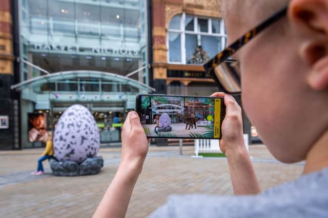 Eight-year-old Oscar Moody uses the augmented reality app. PIC: James Hardisty