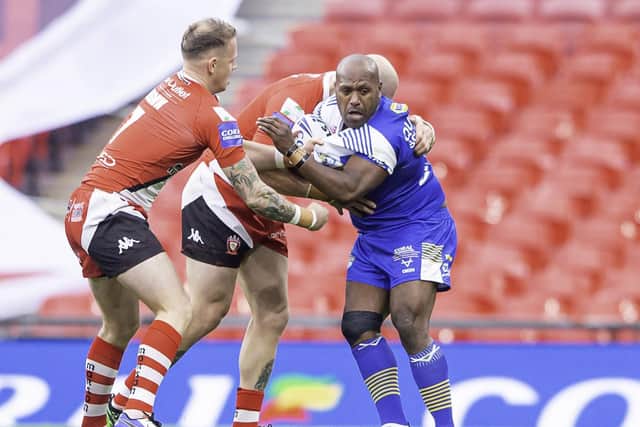 Rob Lui tackled by Salford's Kevin Brown and Gild Dudson at Wembley last year. Picture by Allan McKenzie/SWpix.com.