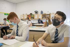 Pupils wearing masks in the classroom (photo: PA).